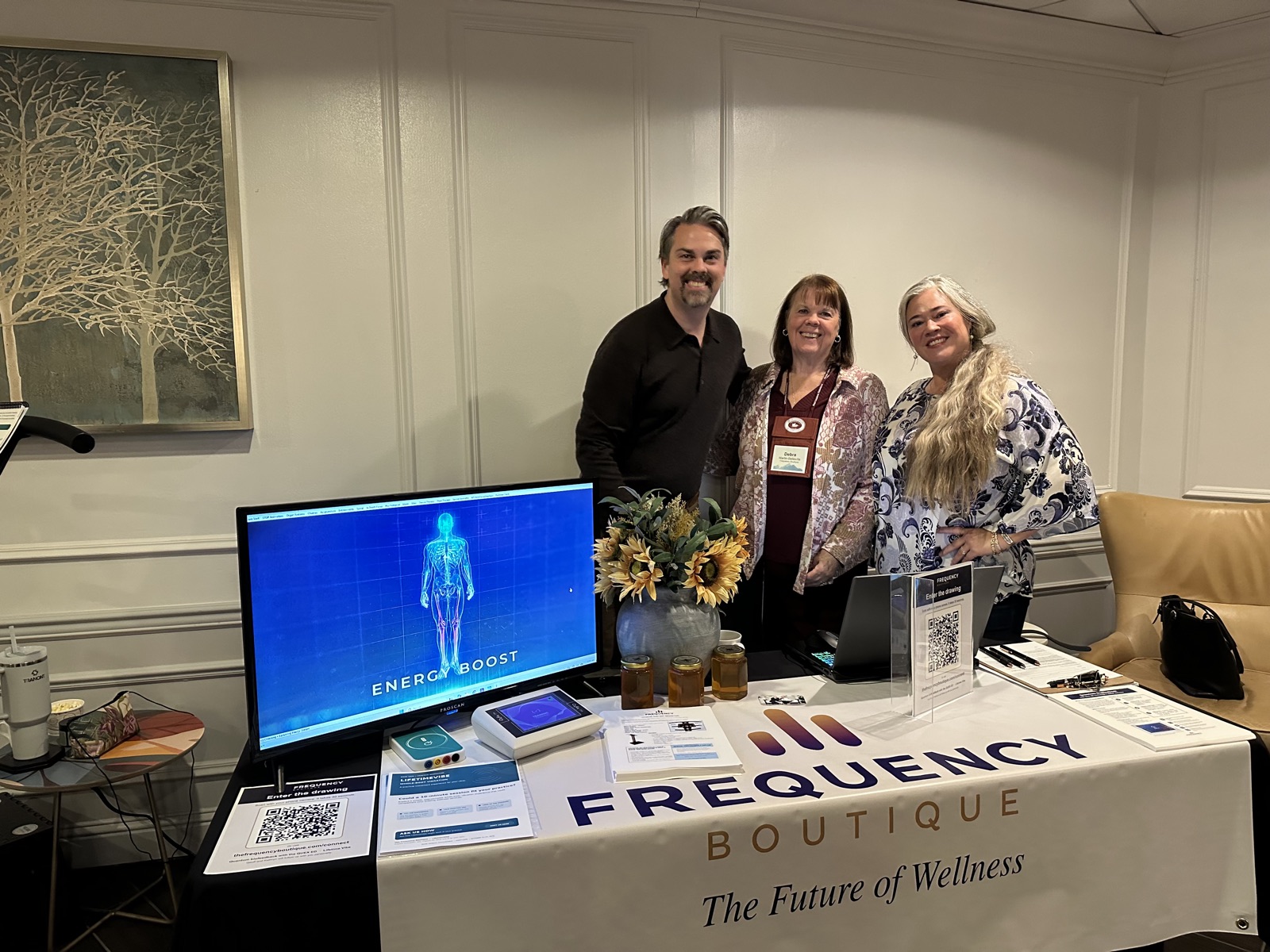 Geoff, Kathryn and a friend at The Frequency Boutique booth