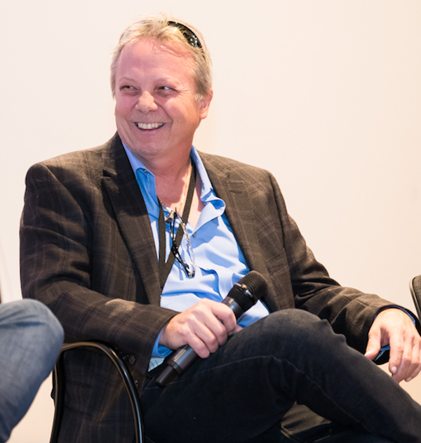 Brad Poulos on a panel at a trade conference
