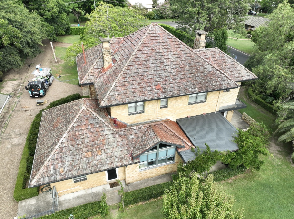 Before: Coastal Roof Softwash