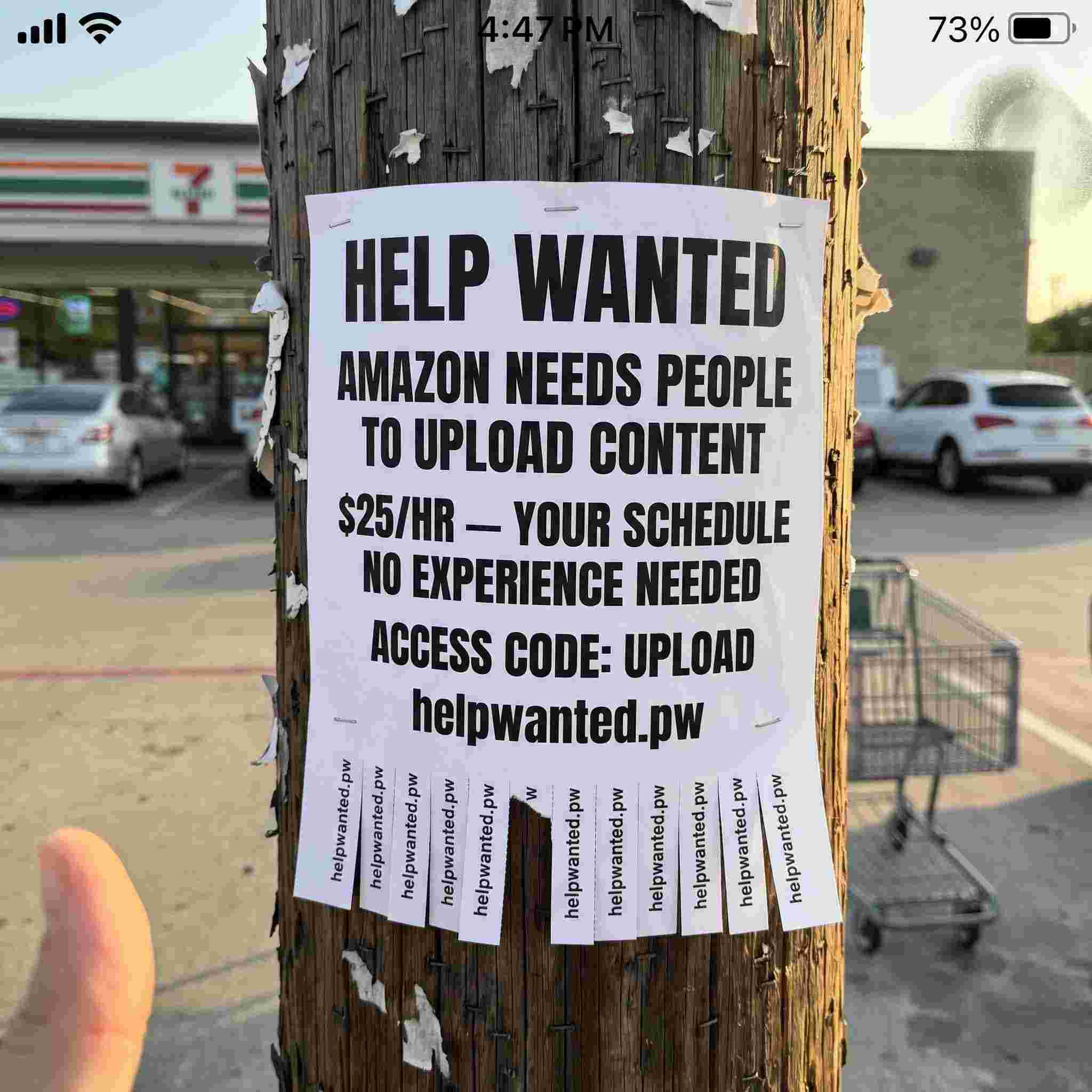 Photo of a Help Wanted flyer on a telephone pole