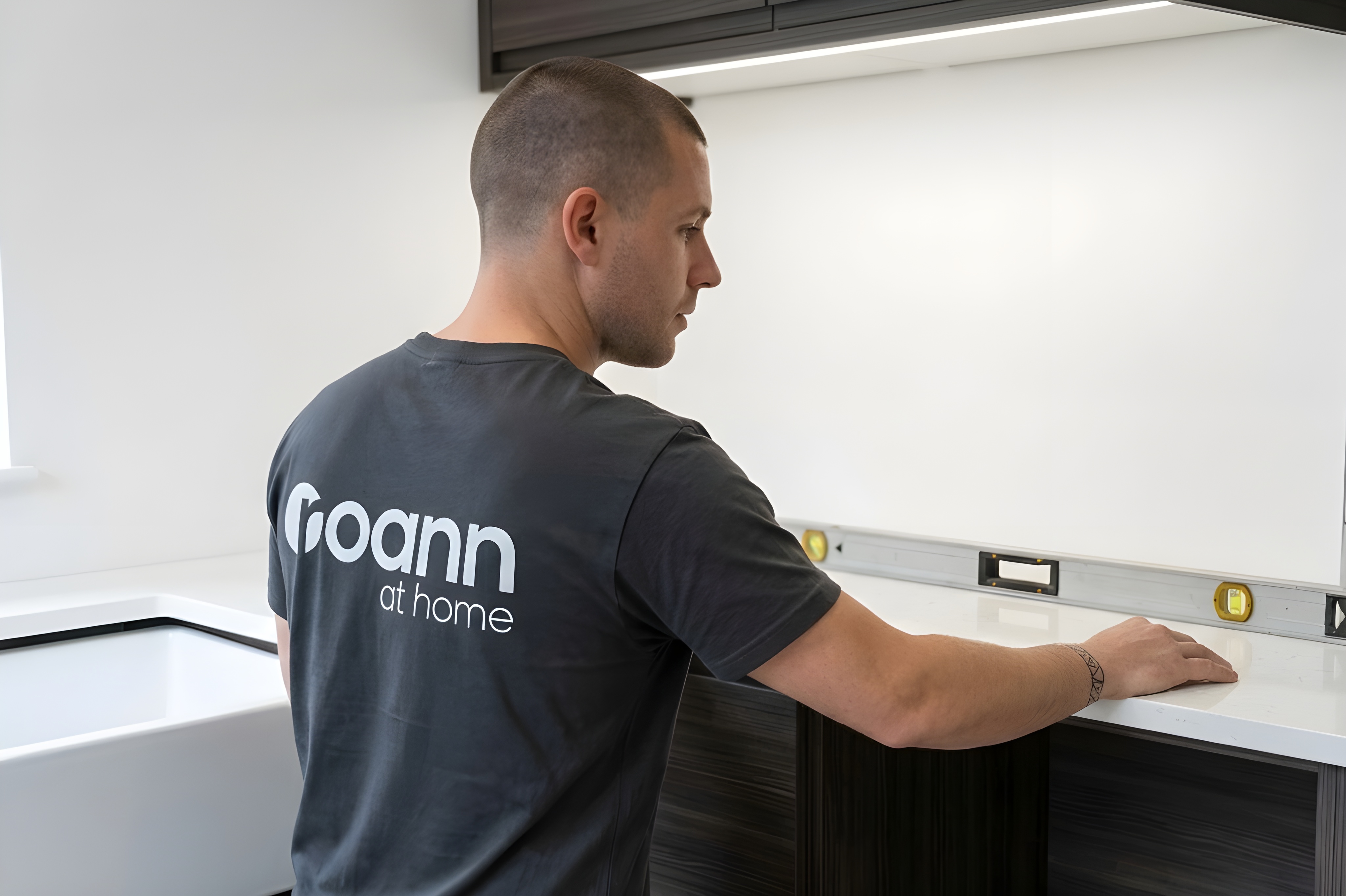 Roann installer fitting a worktop