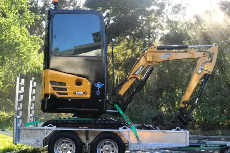 Digger on trailer