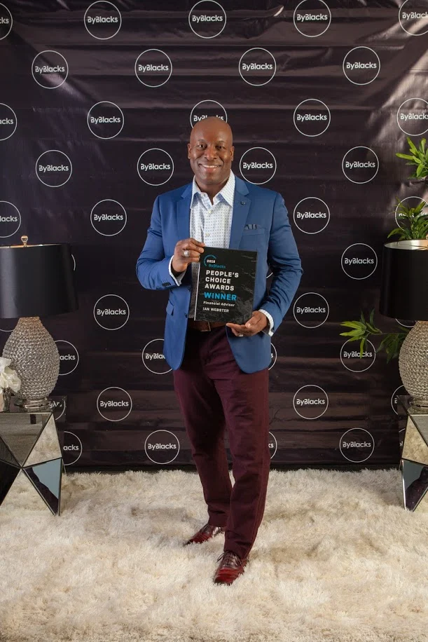 Ian Webster holding his ByBlacks People's Choice Award