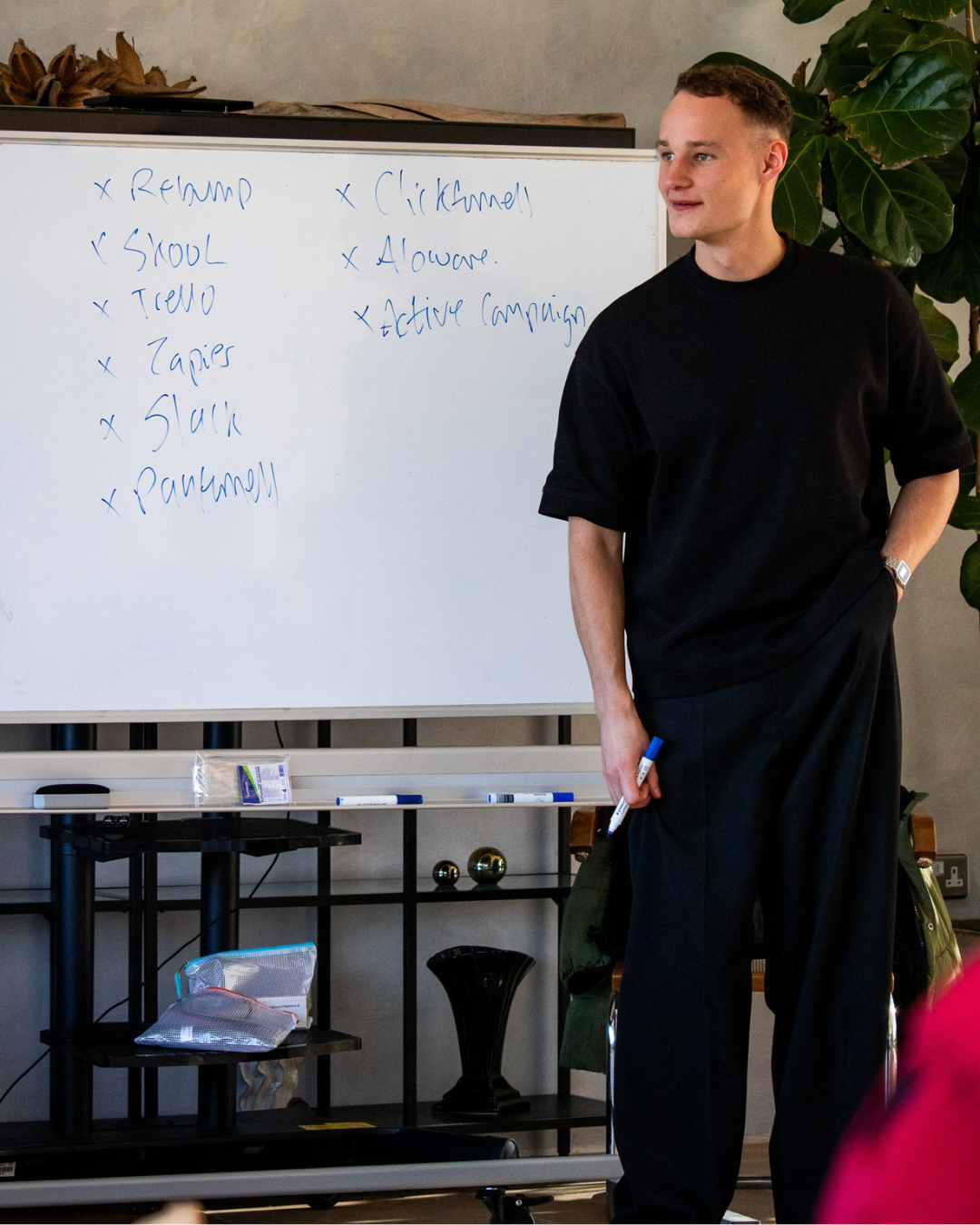 Charlie Morgan teaching in front of a whiteboard