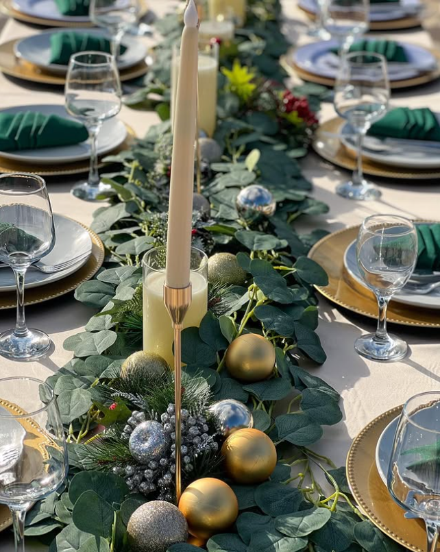 Elegant picnic tablescape with champagne and florals