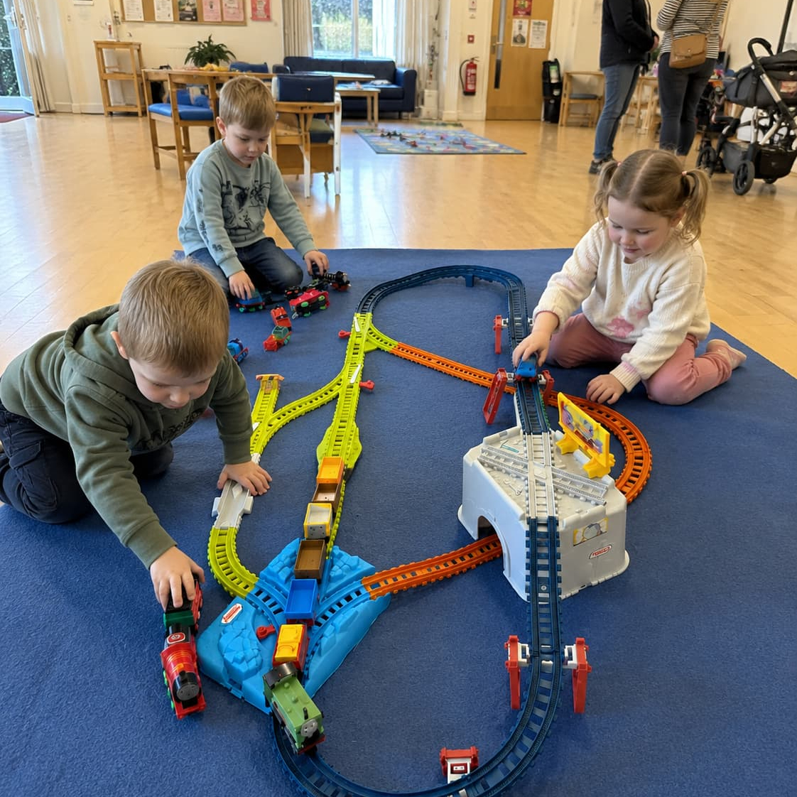 Toddler stacking wooden blocks during a calm indoor play session Toddler stacking wooden blocks during a calm indoor play session