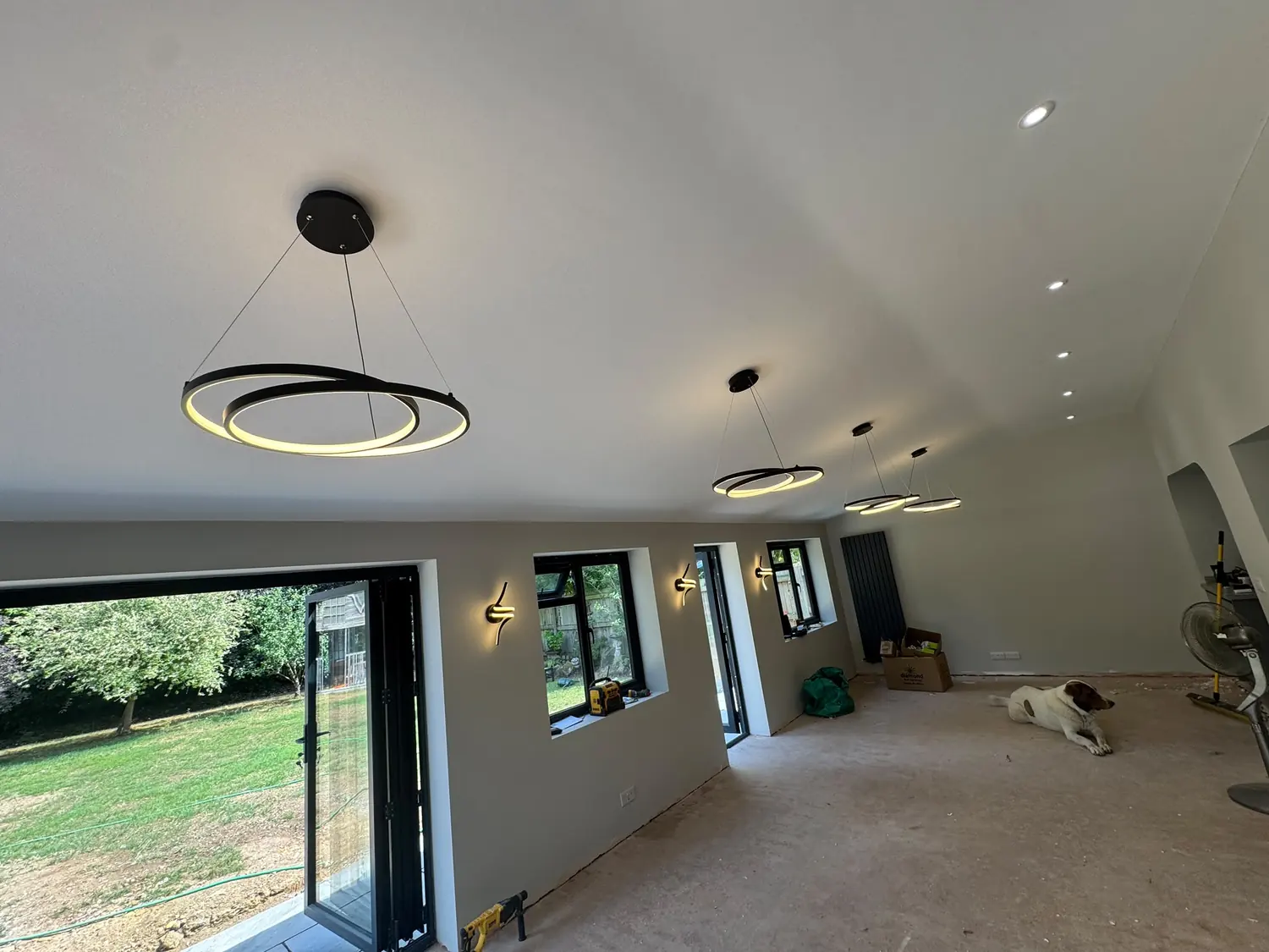 Ring pendant lighting installed over an open-plan kitchen island