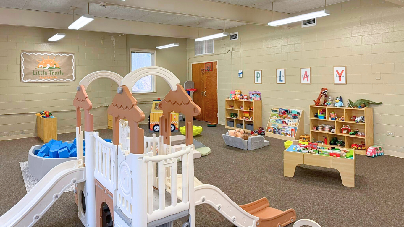 Toddler-safe play area with sensory toys and floor mats.