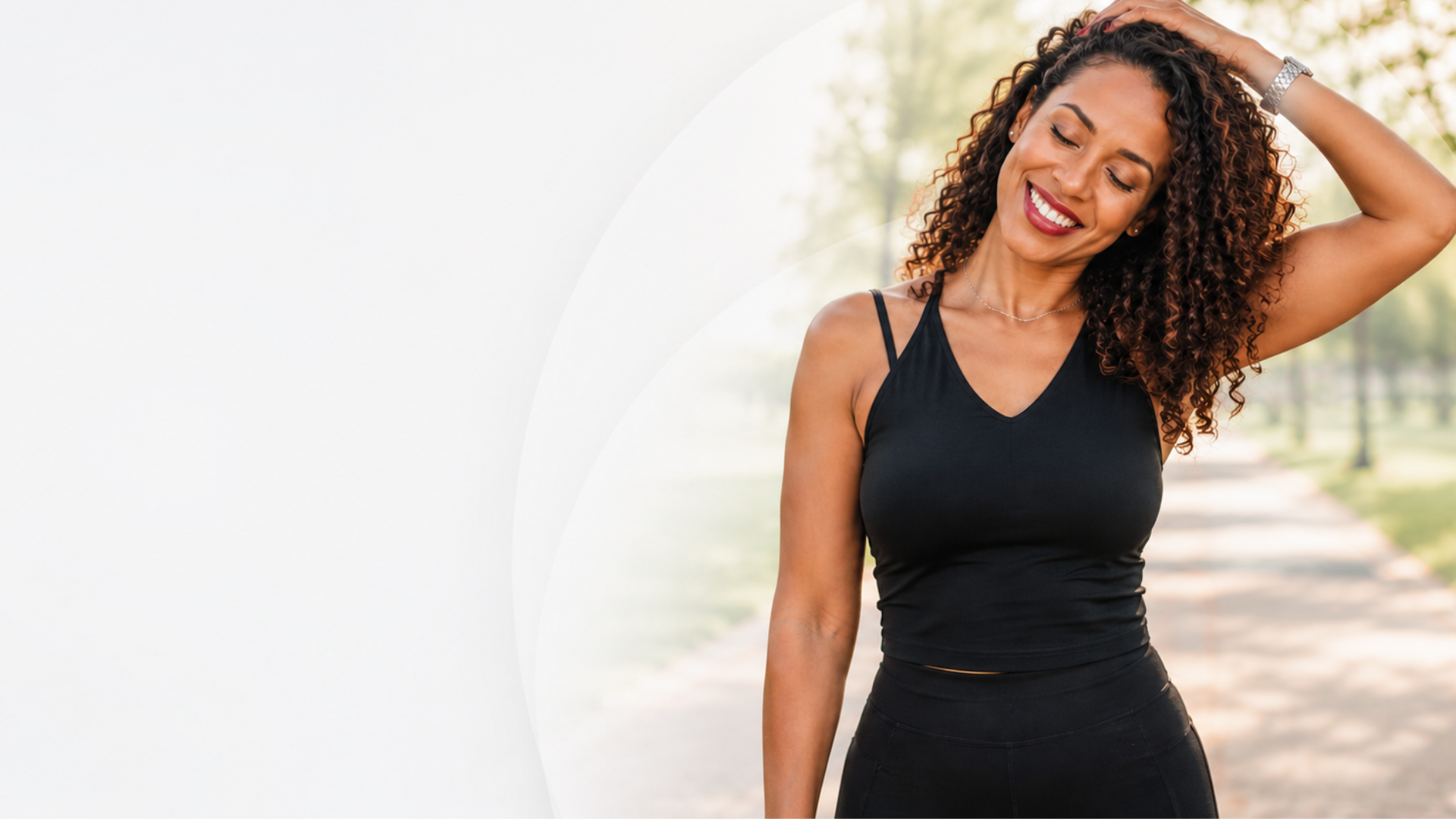 Woman smiling while checking her phone after starting her health assessment