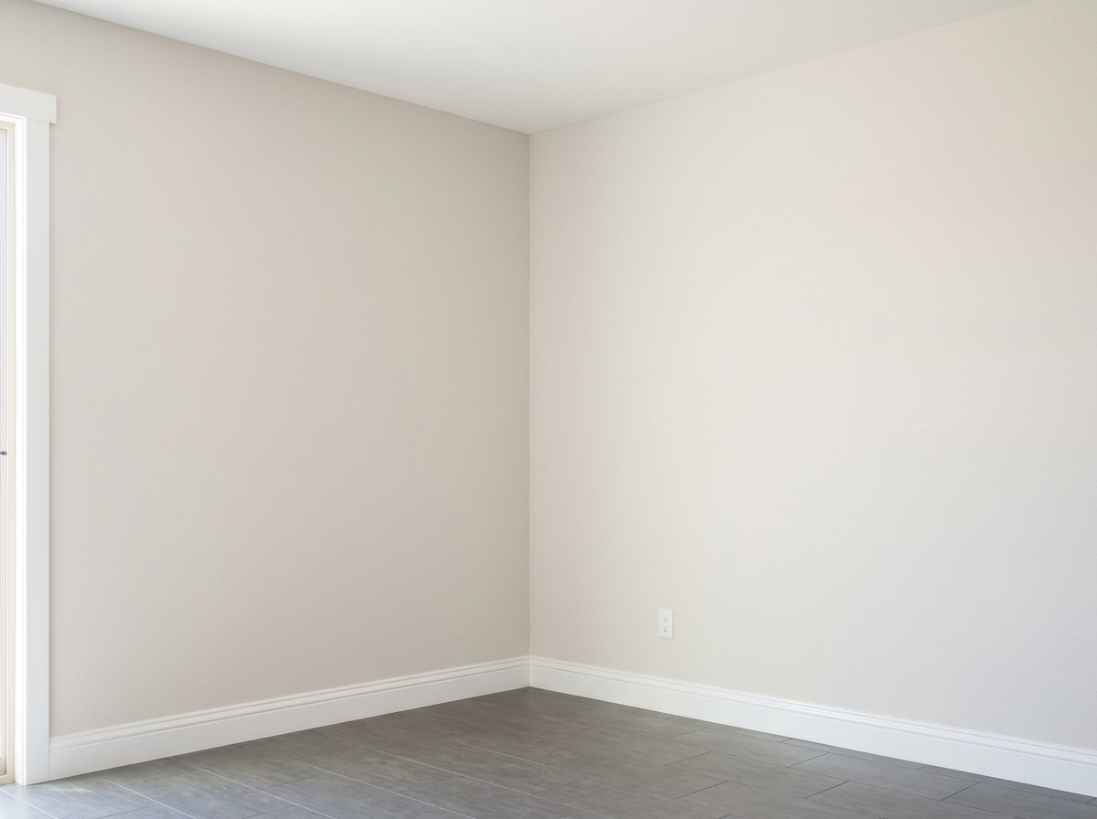 Freshly painted living room walls and white trim