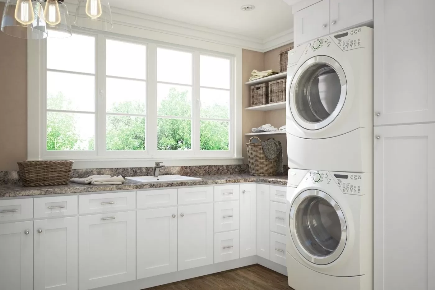 White shaker laundry room with laminate countertops and a bright window