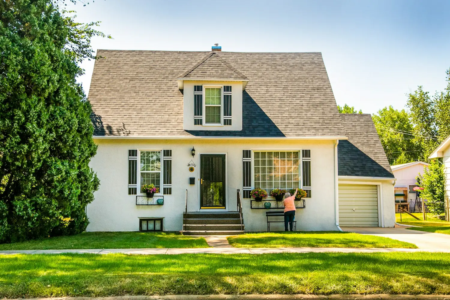 Coordinated exterior renovation with modern materials and outdoor details