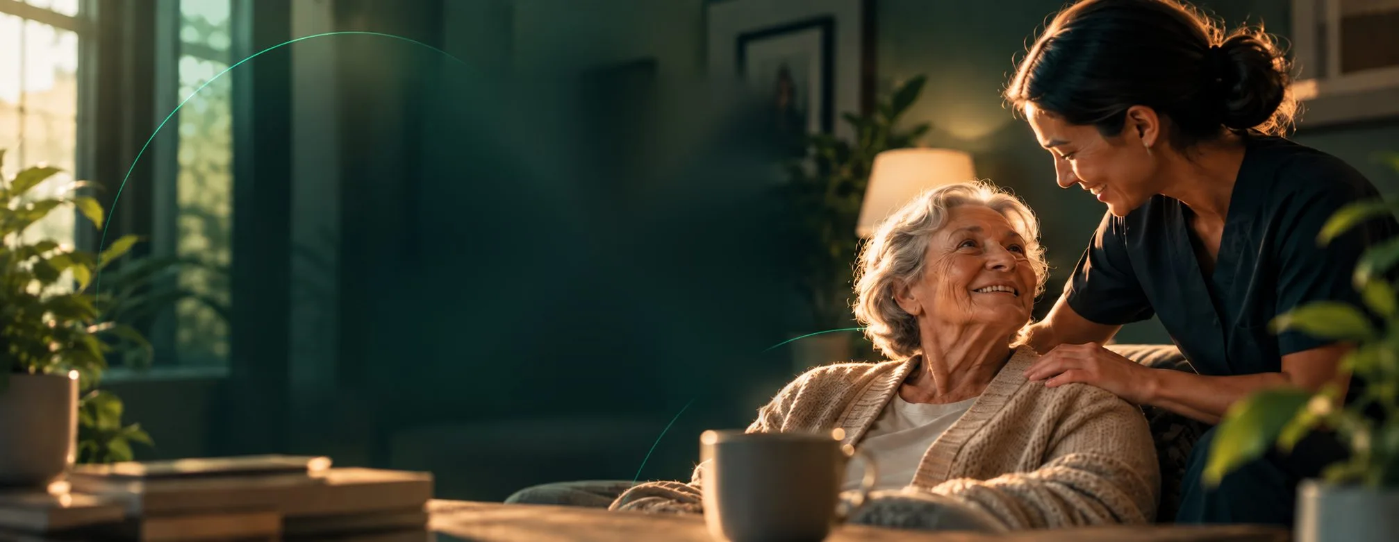 Caregiver smiling with an older client in a sunlit living room.