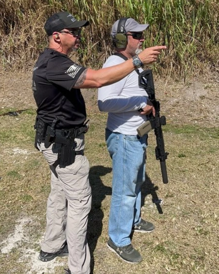 Professional evaluating a premium handgun