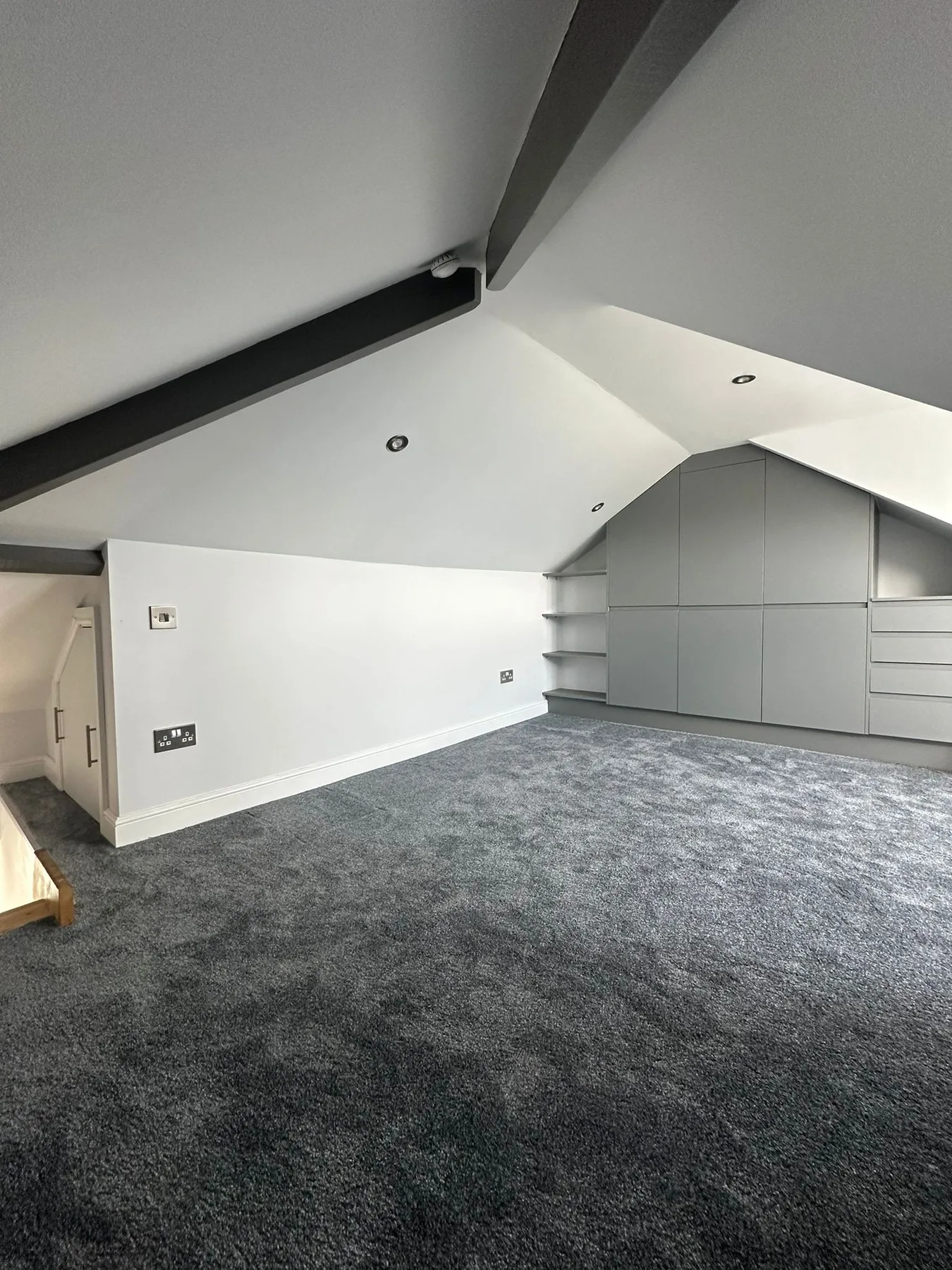 Attic conversion by L W Construction — Newlyn, Cornwall — loft room finished, eaves storage