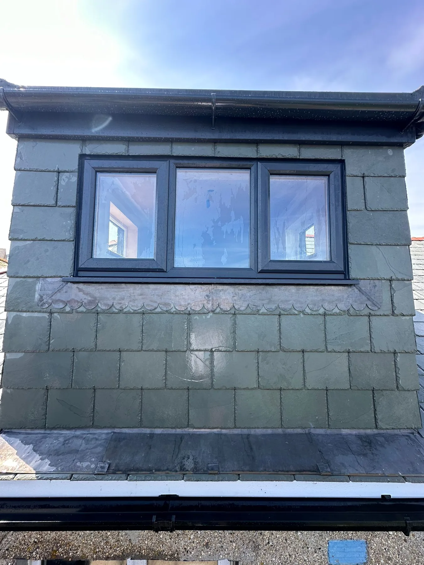 Attic conversion by L W Construction — Newlyn, Cornwall — exterior dormer front window detail