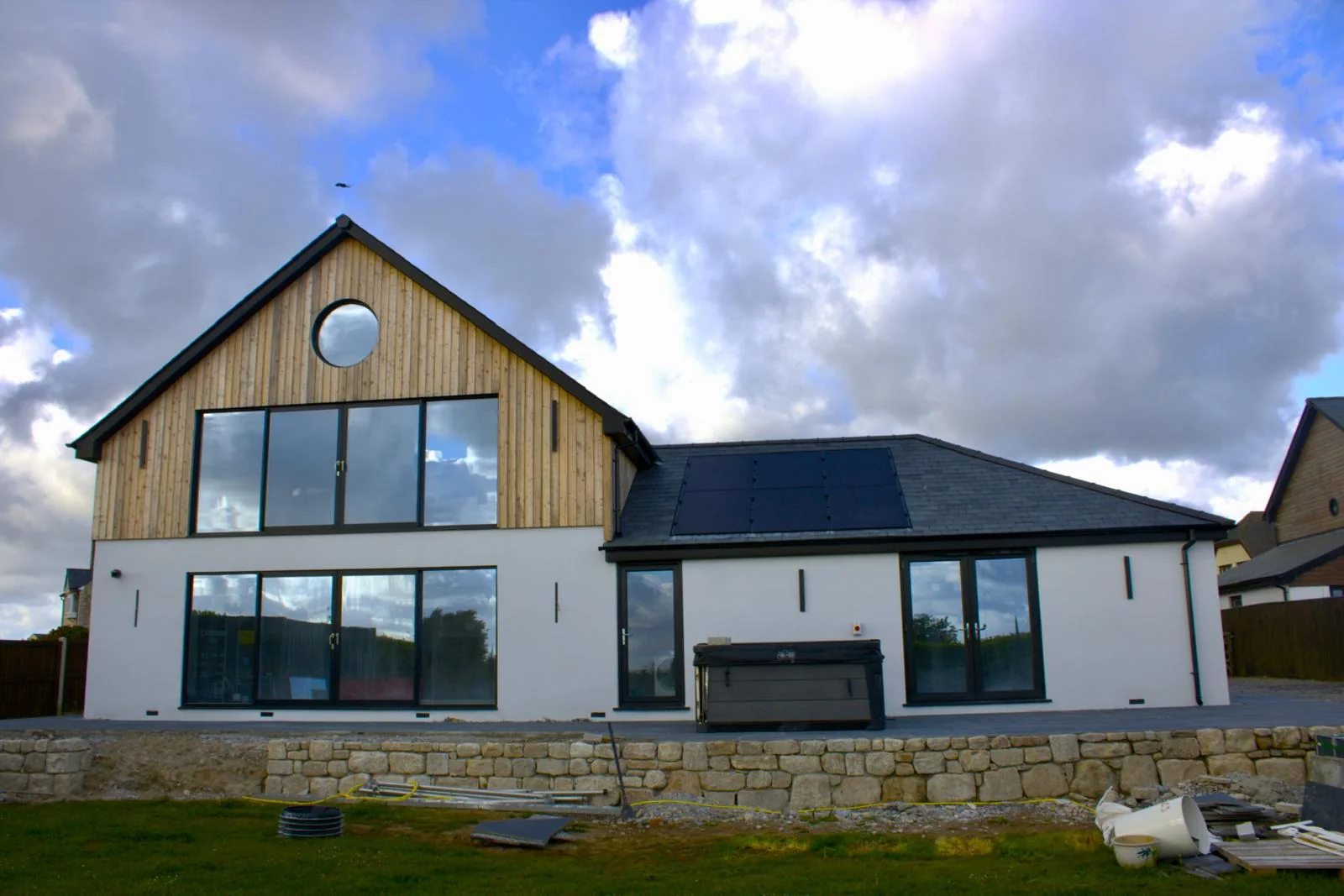 Cornwall premium new build by L W Construction — finished exterior front elevation wide, recent project