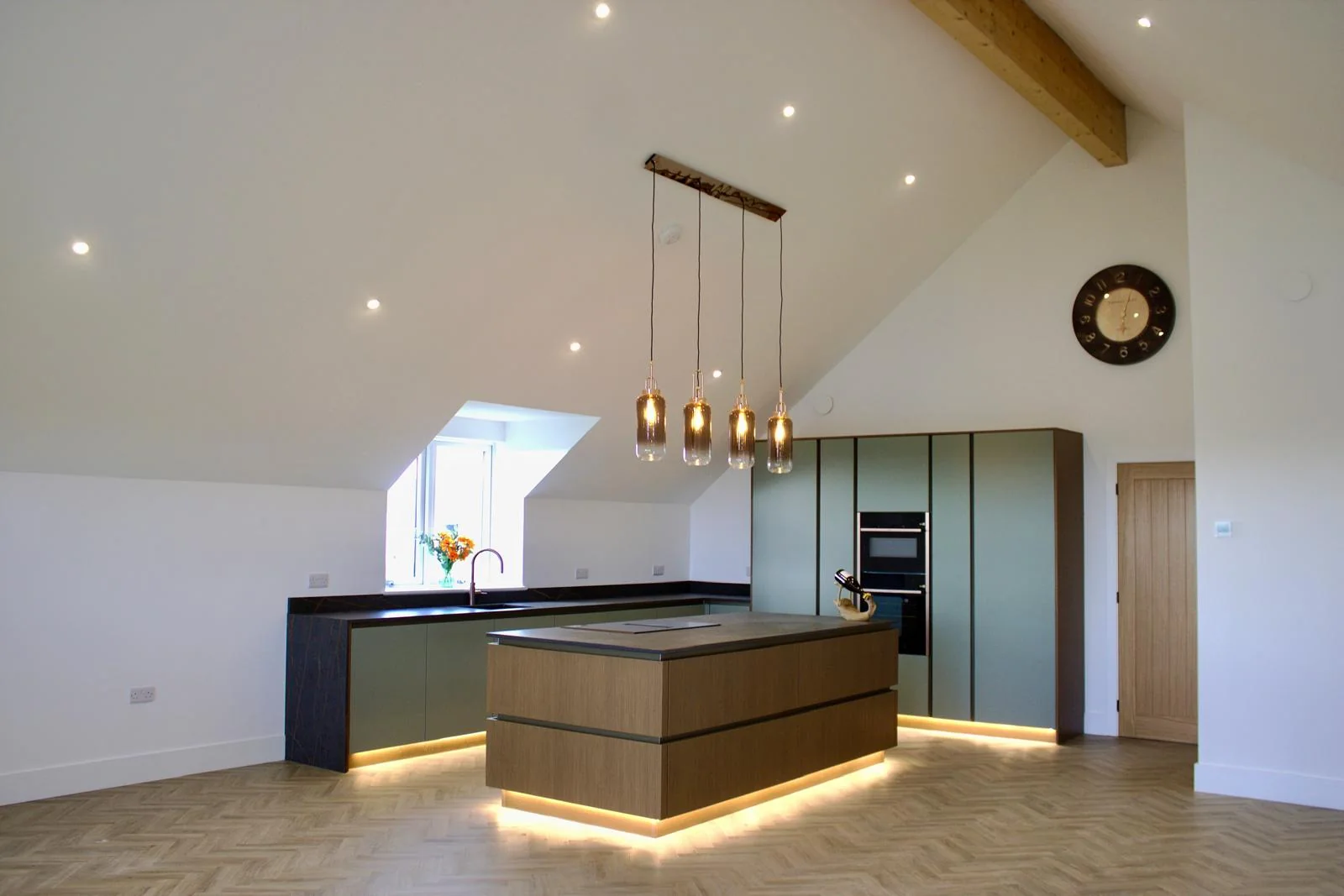 Recent Cornwall work by L W Construction — finished open-plan kitchen and dining, premium new build