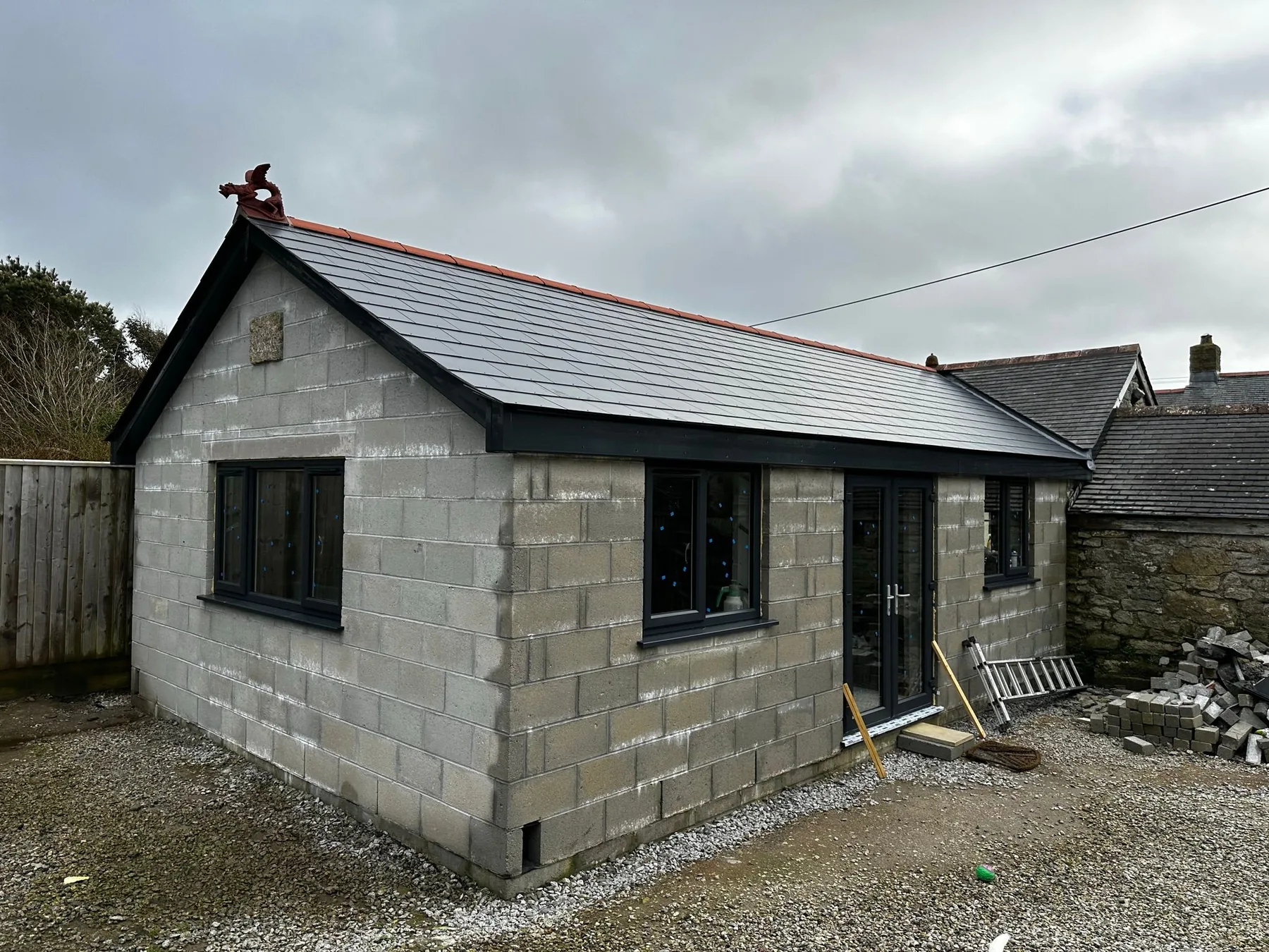 Extension at Joppa Farm, St Just by L W Construction — exterior blockwork and roof shell during build