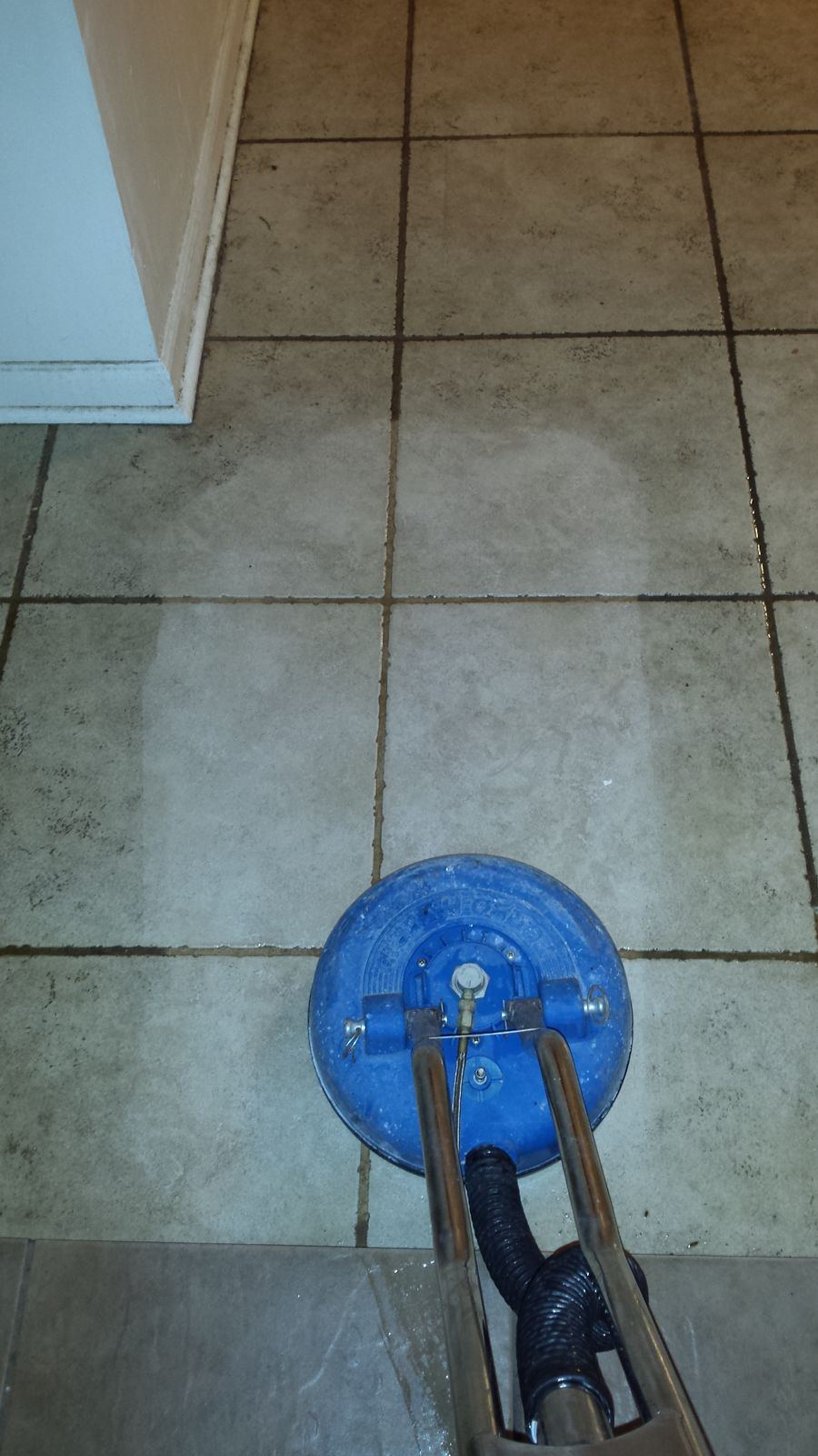 Tile with dark grout before cleaning
