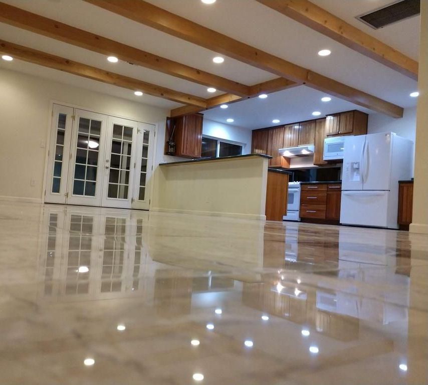 Polished stone floor in an East Valley kitchen after an Abracadabra clean and polish