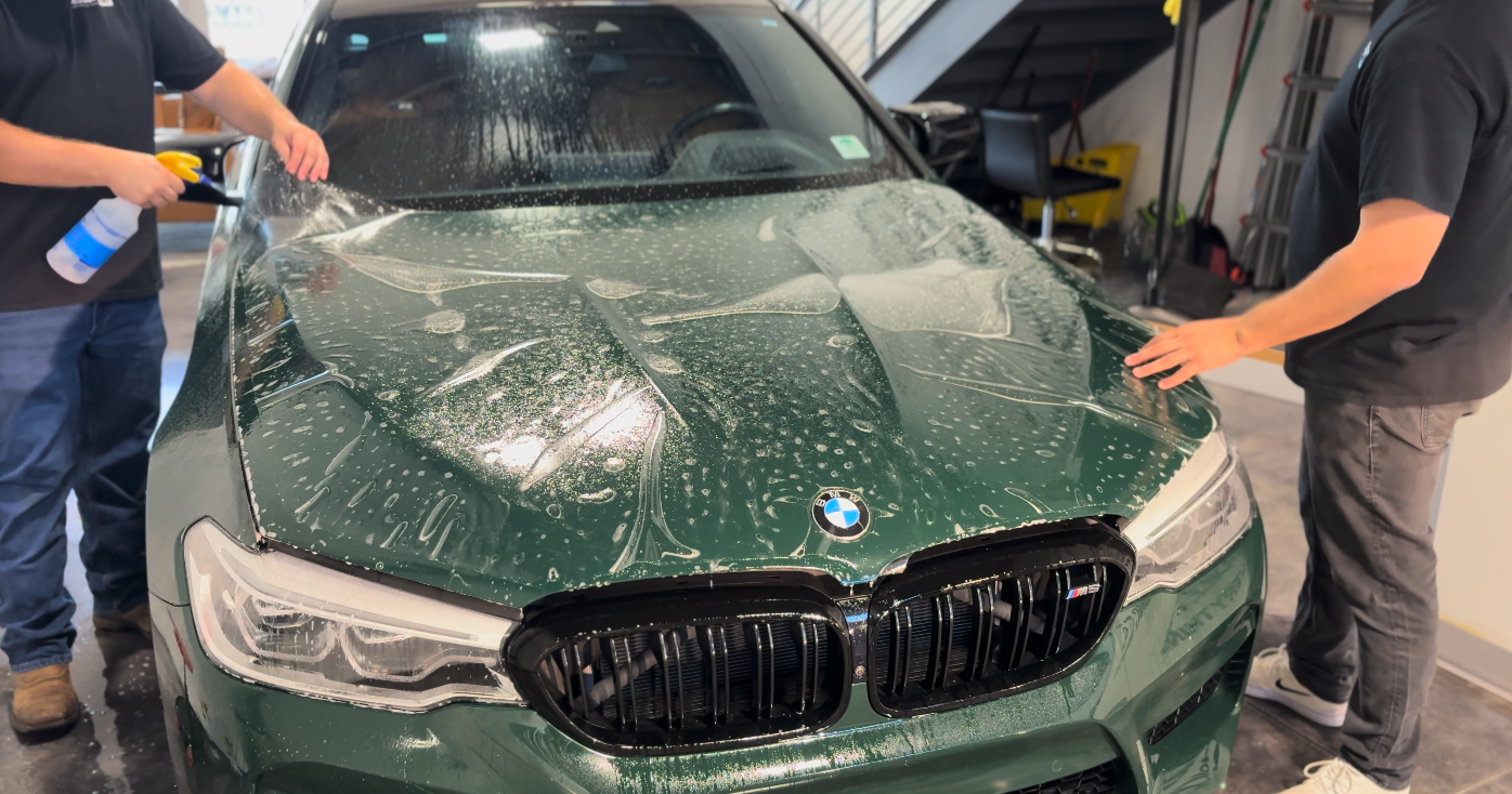 XPEL paint protection film being installed on a BMW at Mission Tint in Bonita Springs