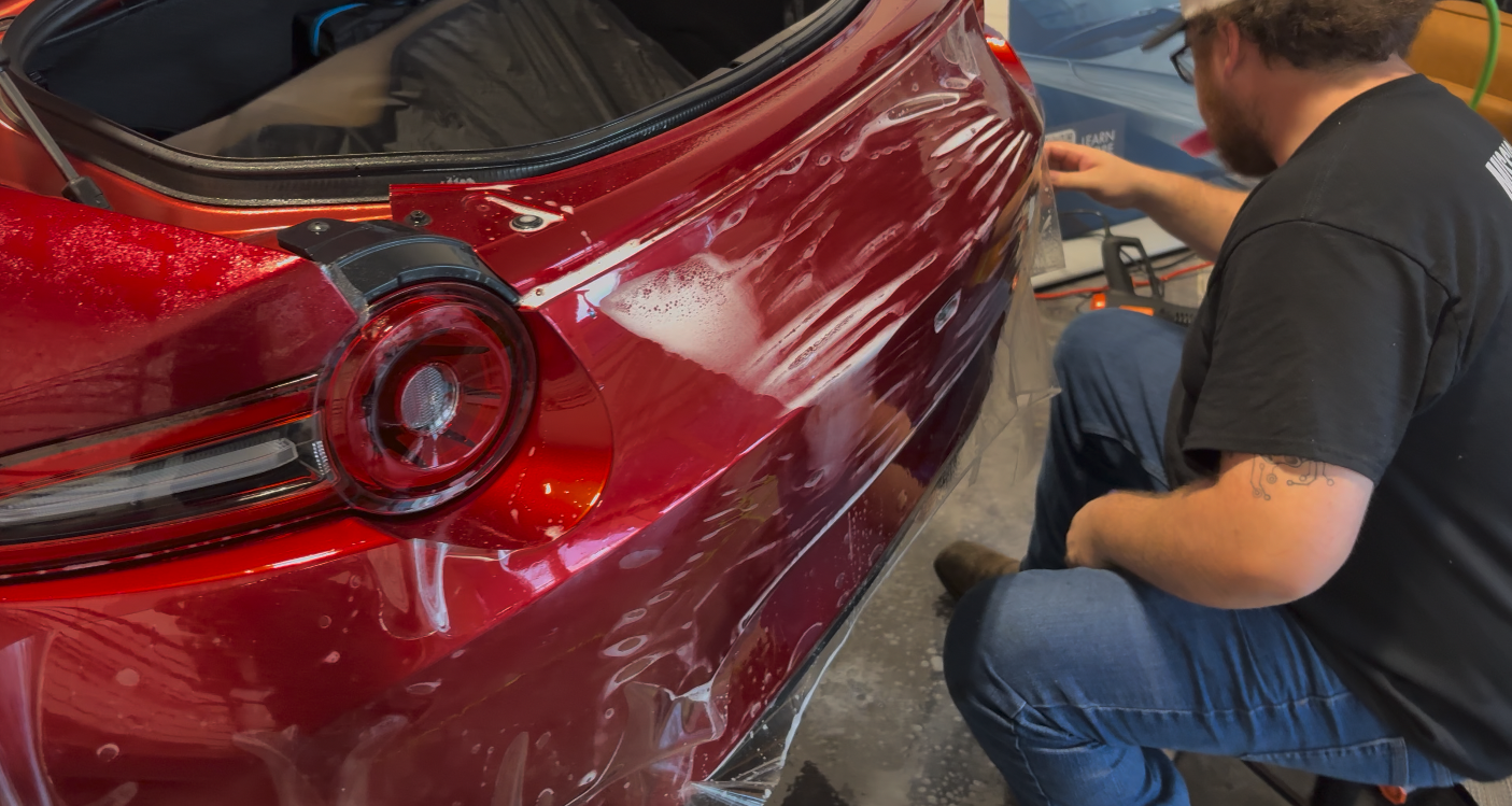 XPEL self-healing paint protection film being installed at Mission Tint in Bonita Springs
