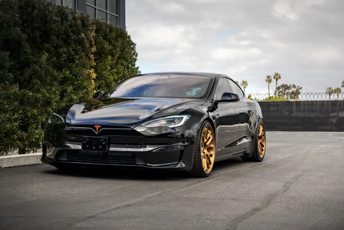 Black Tesla Model S with bronze wheels after ceramic coating by Mission Tint