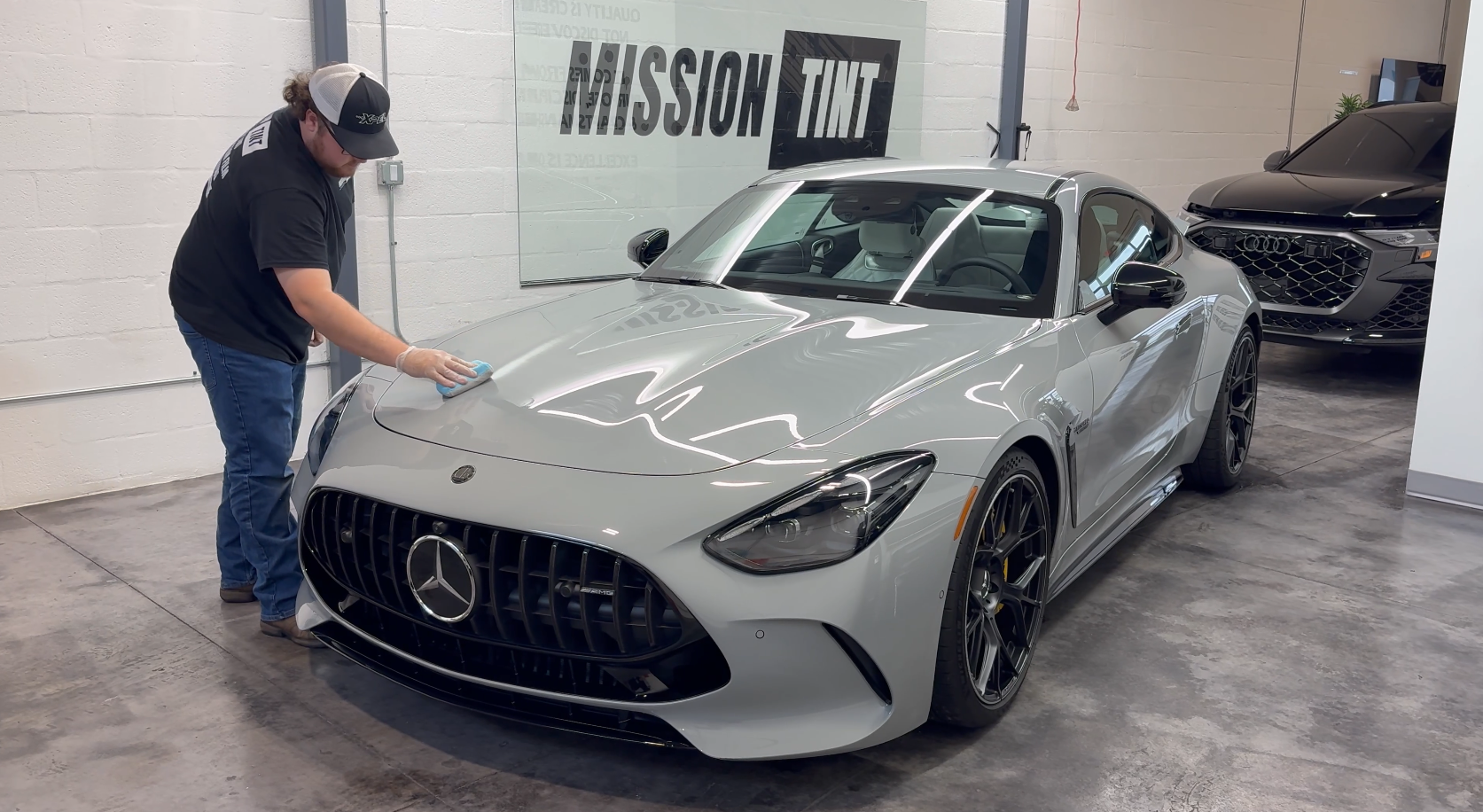 Ceramic coating being applied to a Mercedes-AMG GT at Mission Tint in Bonita Springs