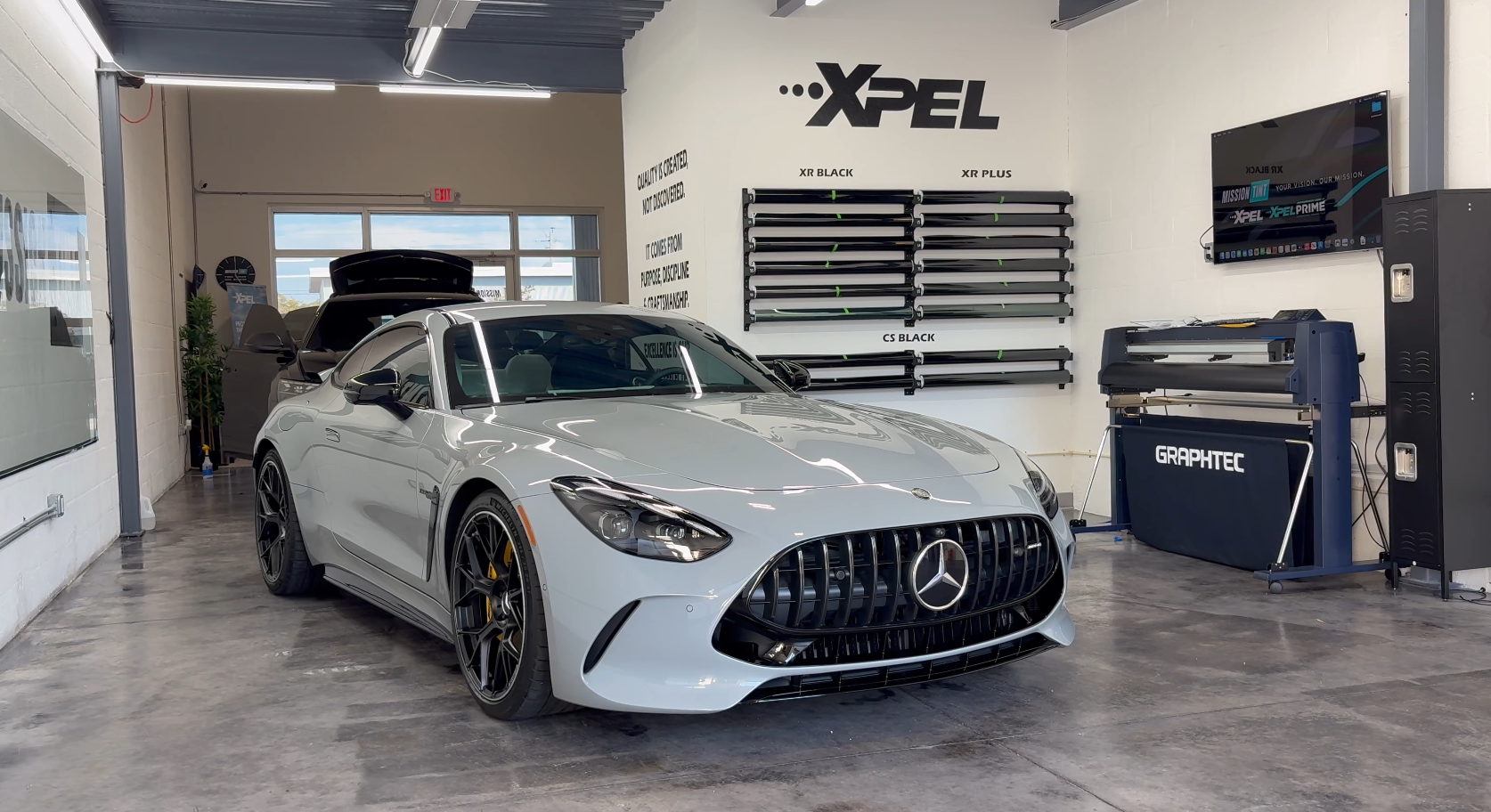2026 Mercedes-Benz AMG GT 55 in the Mission Tint shop, second view