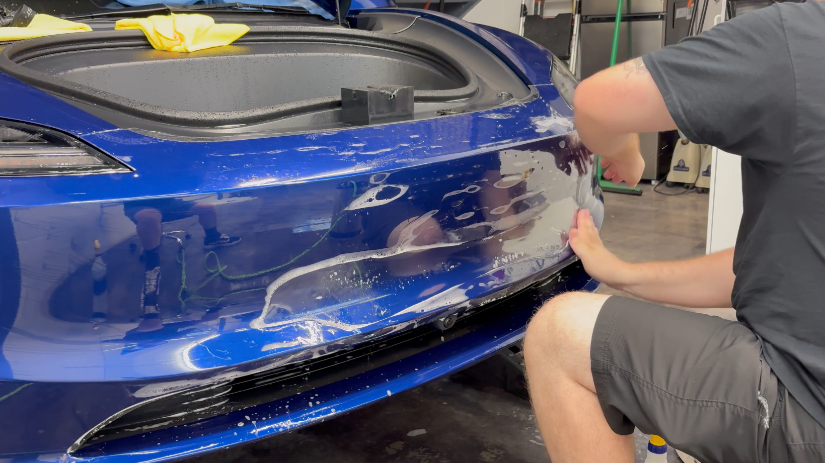 XPEL Clear Bra paint protection film applied to a Tesla at Mission Tint in Bonita Springs