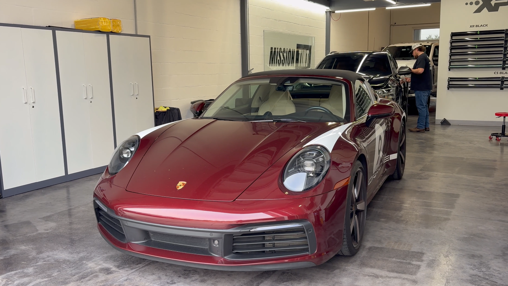 Sports car being detailed in the Mission Tint shop