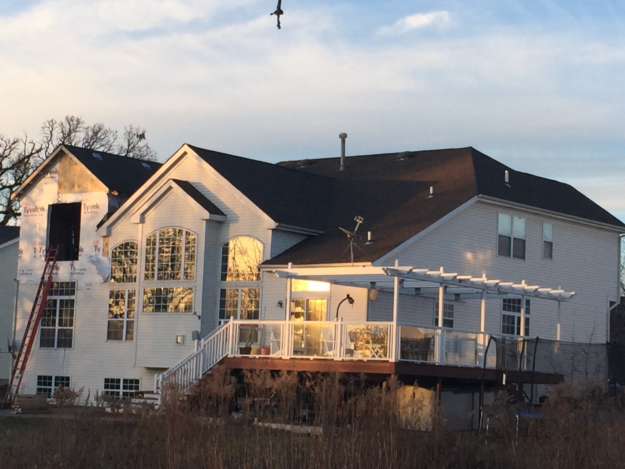 Roofing crew working on roof