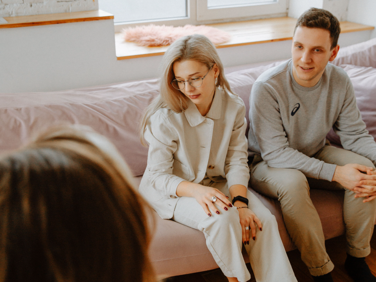 A couple sitting together in a counselling session