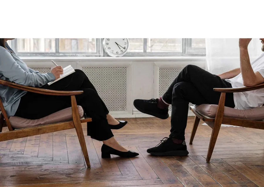 A counselling session in soft daylight