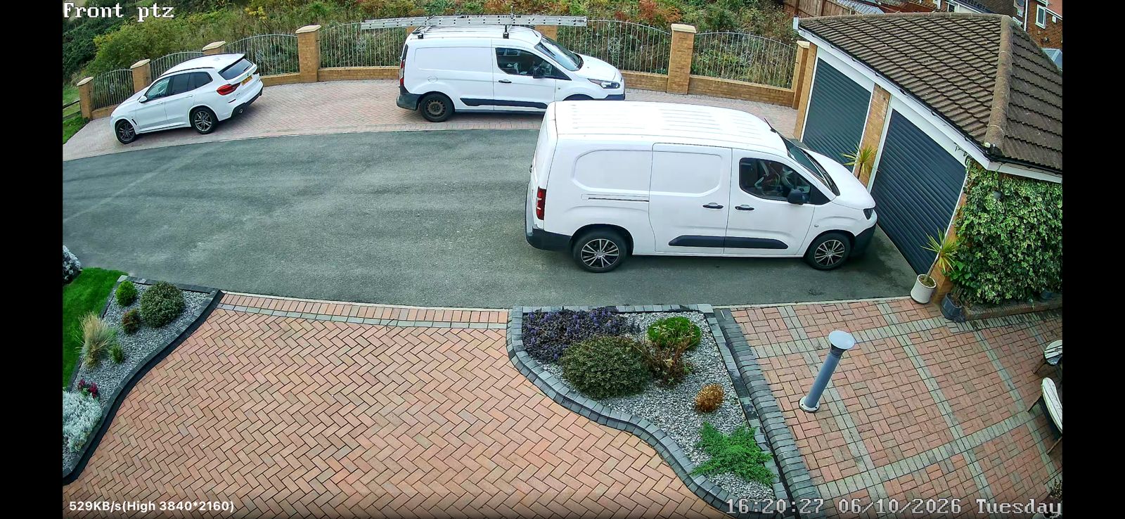 4K PTZ CCTV camera view of a front driveway and garage doors in Sunderland, shown in the phone app 4K PTZ CCTV camera view of a front driveway and garage doors in Sunderland, shown in the phone app