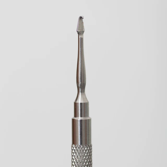 Photo of the unique tip of the Preston Comedone Rxtractor that allows for targeted pressure on clogged follicles, thereby enabling smooth removal of impactions with minimal discomfort for the client.