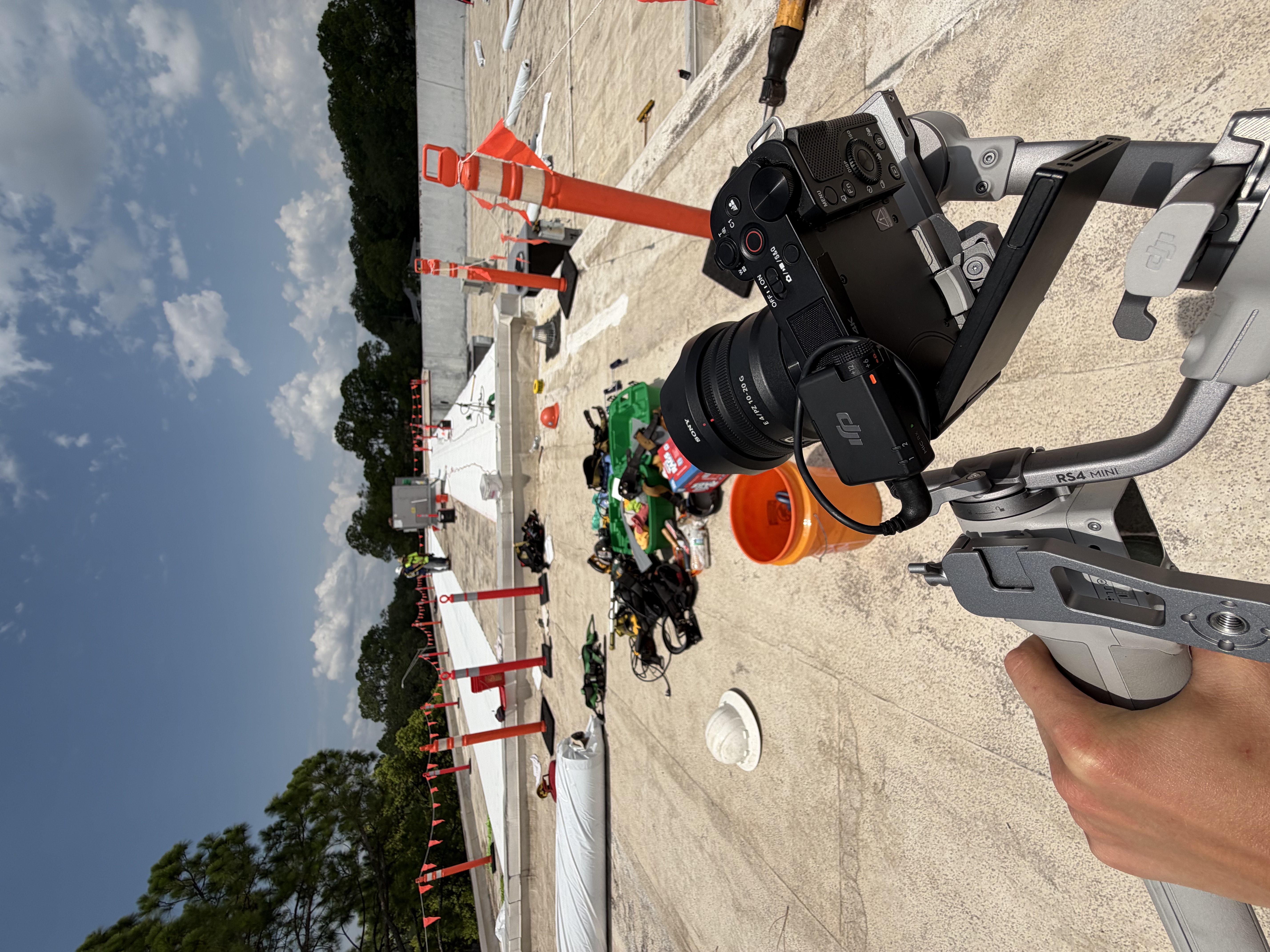 ProntoPro filming on a job site with a gimbal