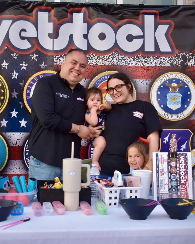 Emily Rieger with her family at the Vetstock booth