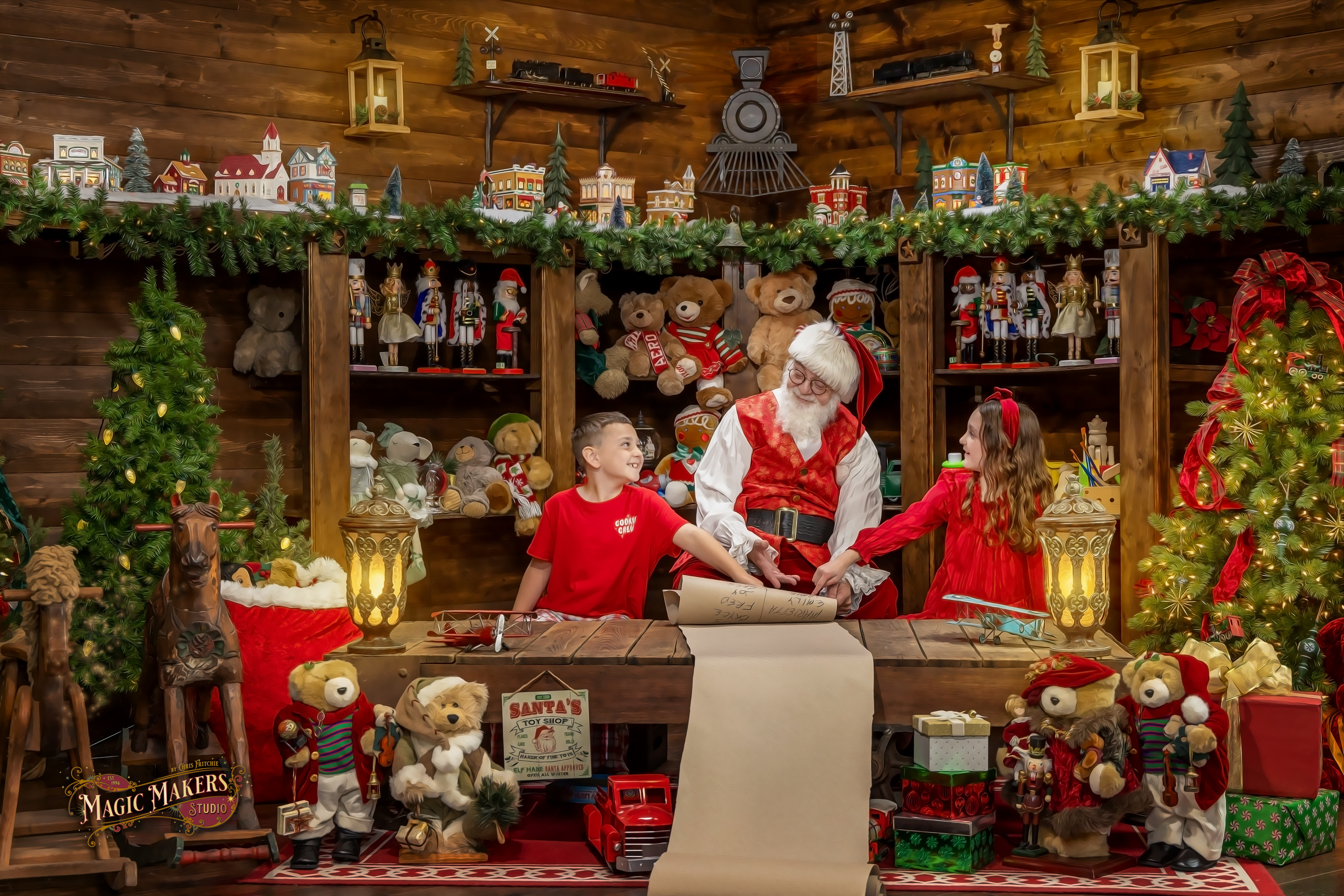 A Christmas portrait moment with Santa and children during The Magic of Santa
