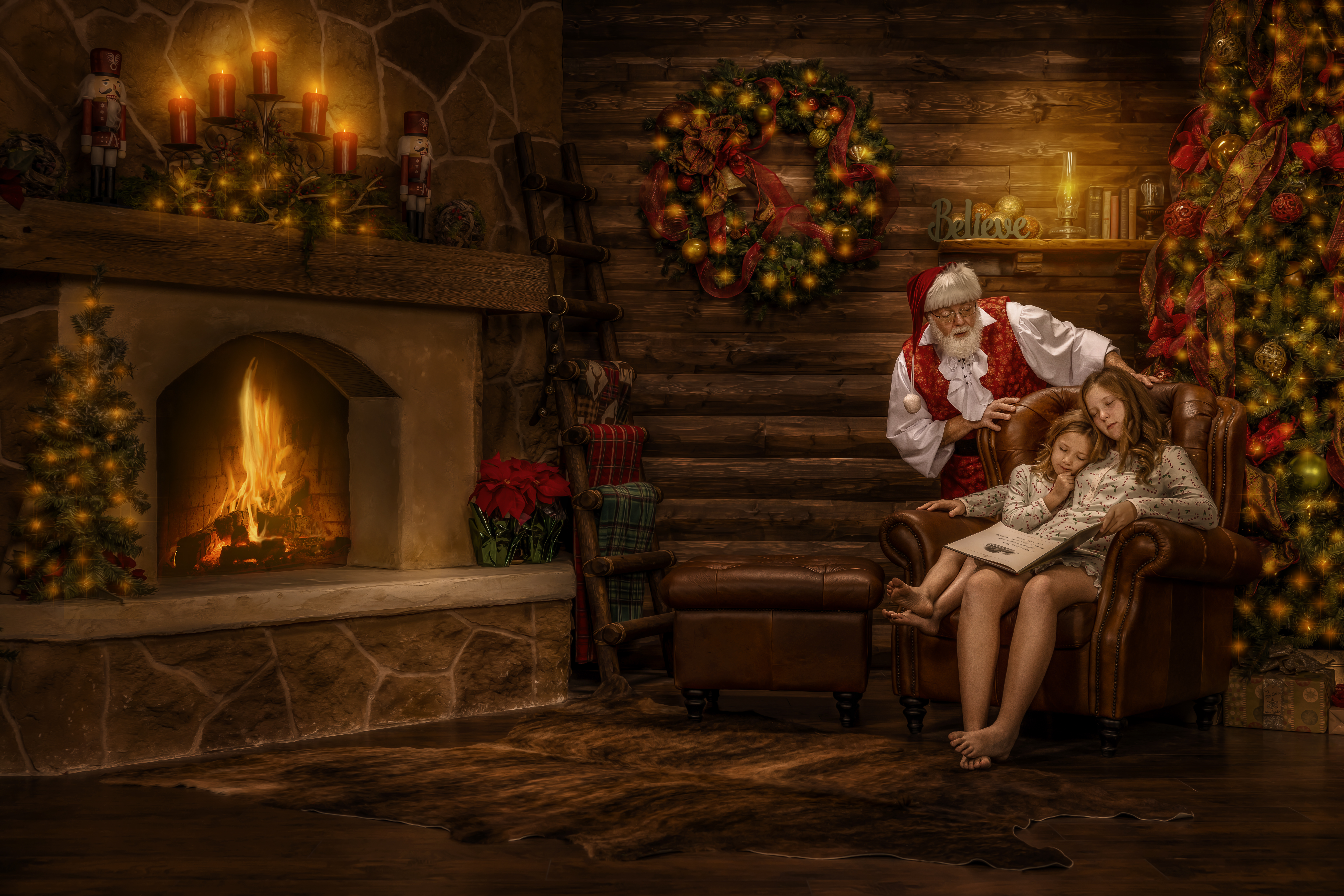 Santa Mike with two sleeping sisters in an award-winning recreation of a Magic of Santa portrait created years earlier