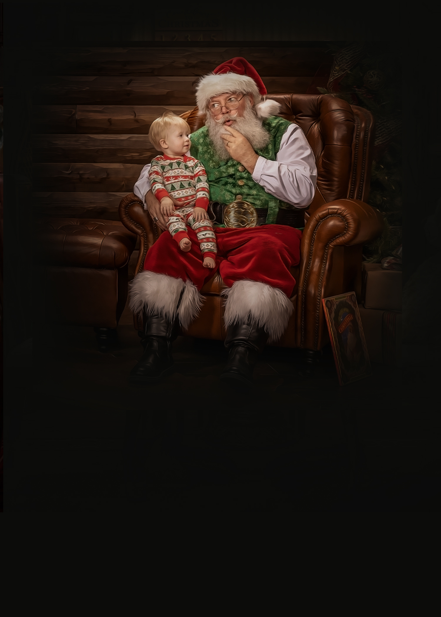 Santa Al sharing a laugh with a child during The Magic of Santa experience
