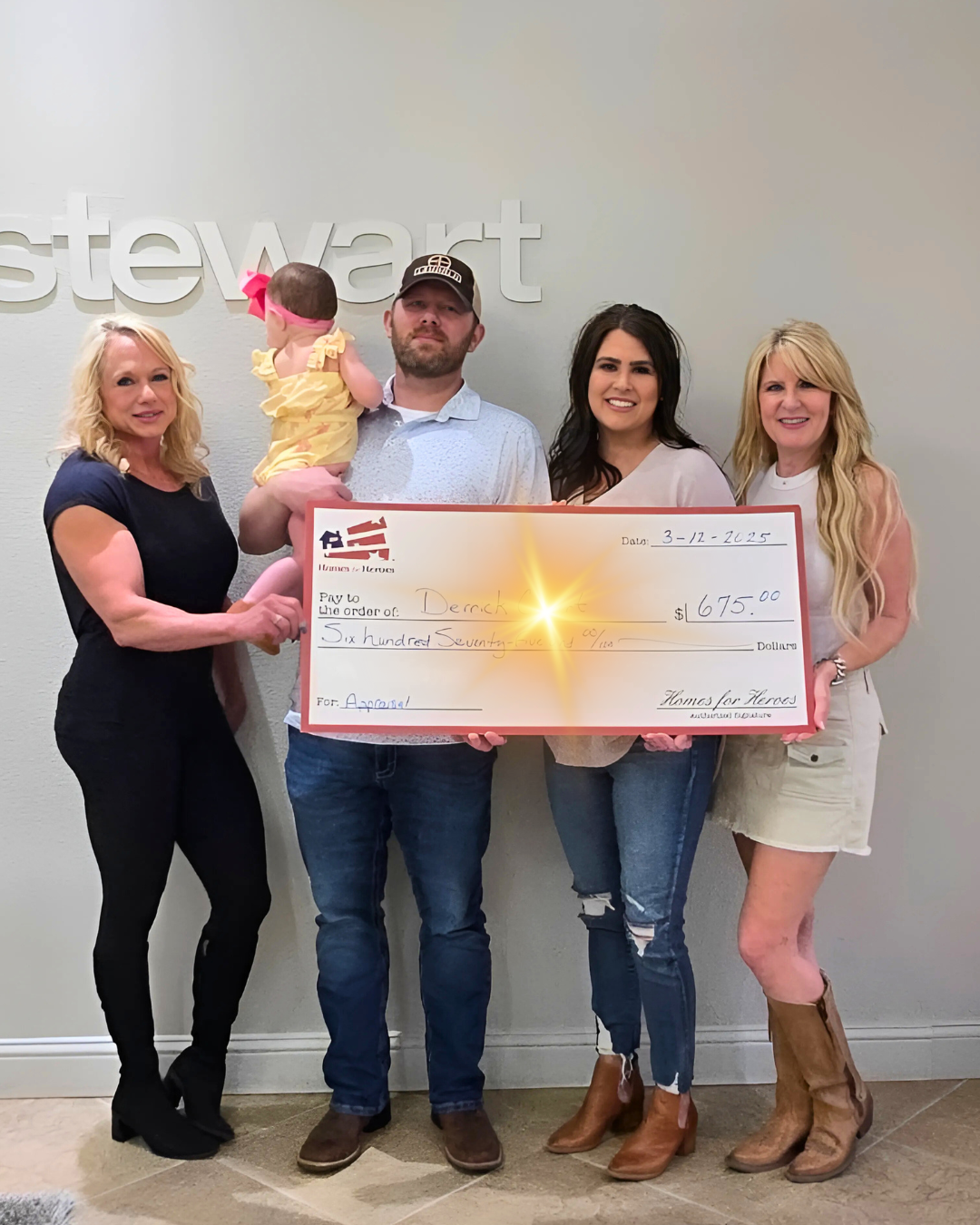 family recieving a check