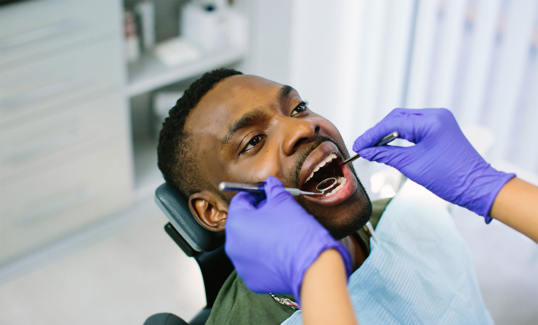 Man holding toothbrush