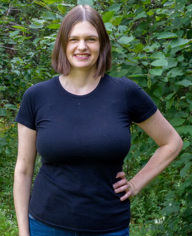 Caro Brookings, suicide bereavement coach, standing outdoors