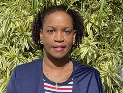 Portrait of Dr. Louise Aurélien-Buie, founder and CEO of Elite Mindful Health.