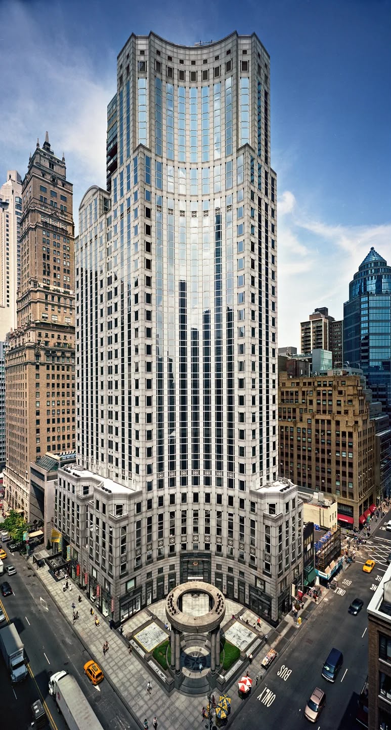 Curved limestone office tower