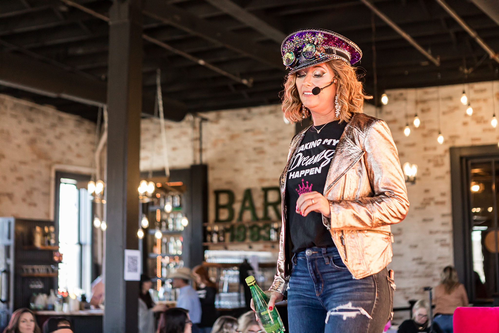 Crissy Conner on stage at a summit