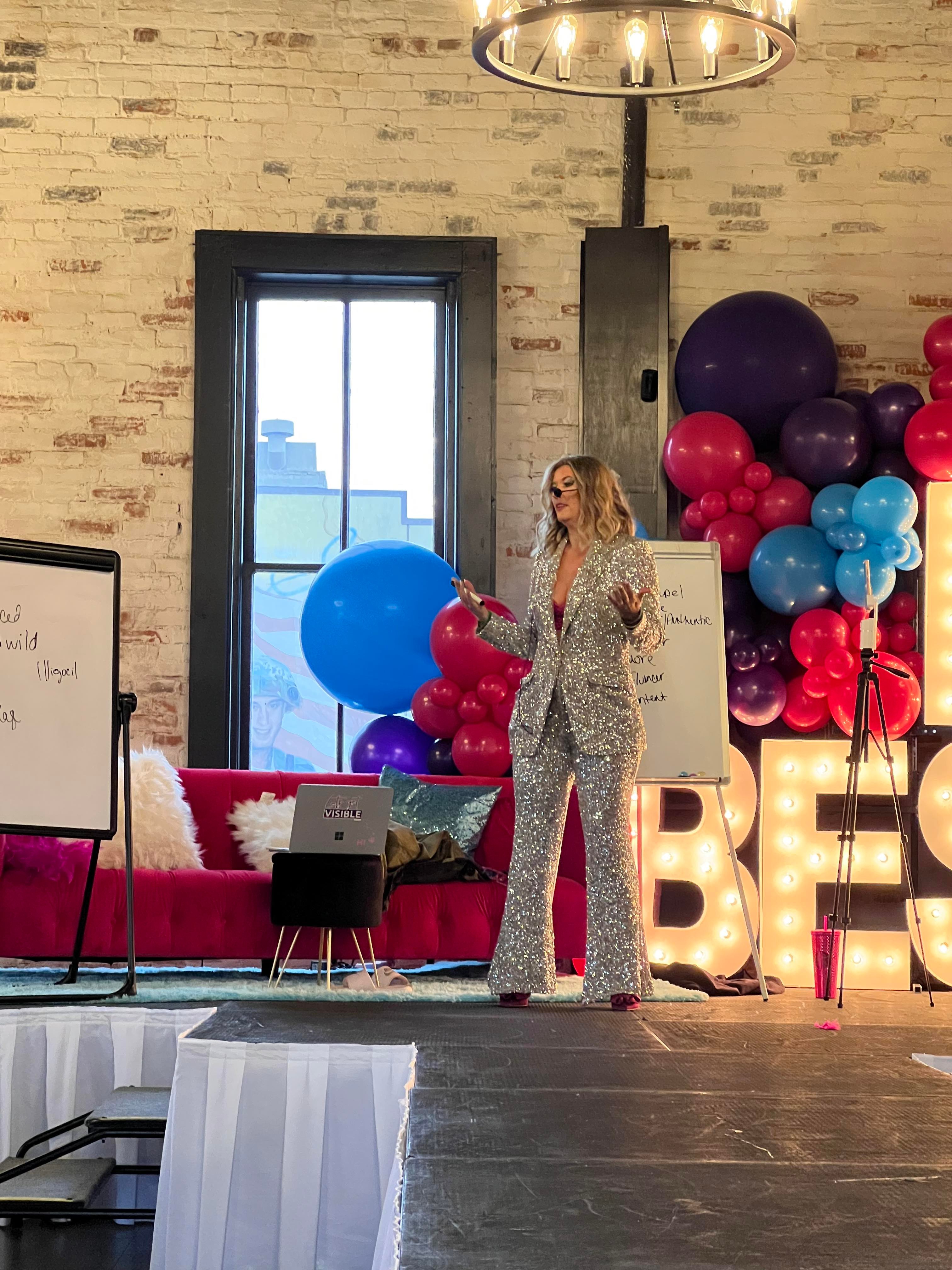 Crissy Conner speaking on stage