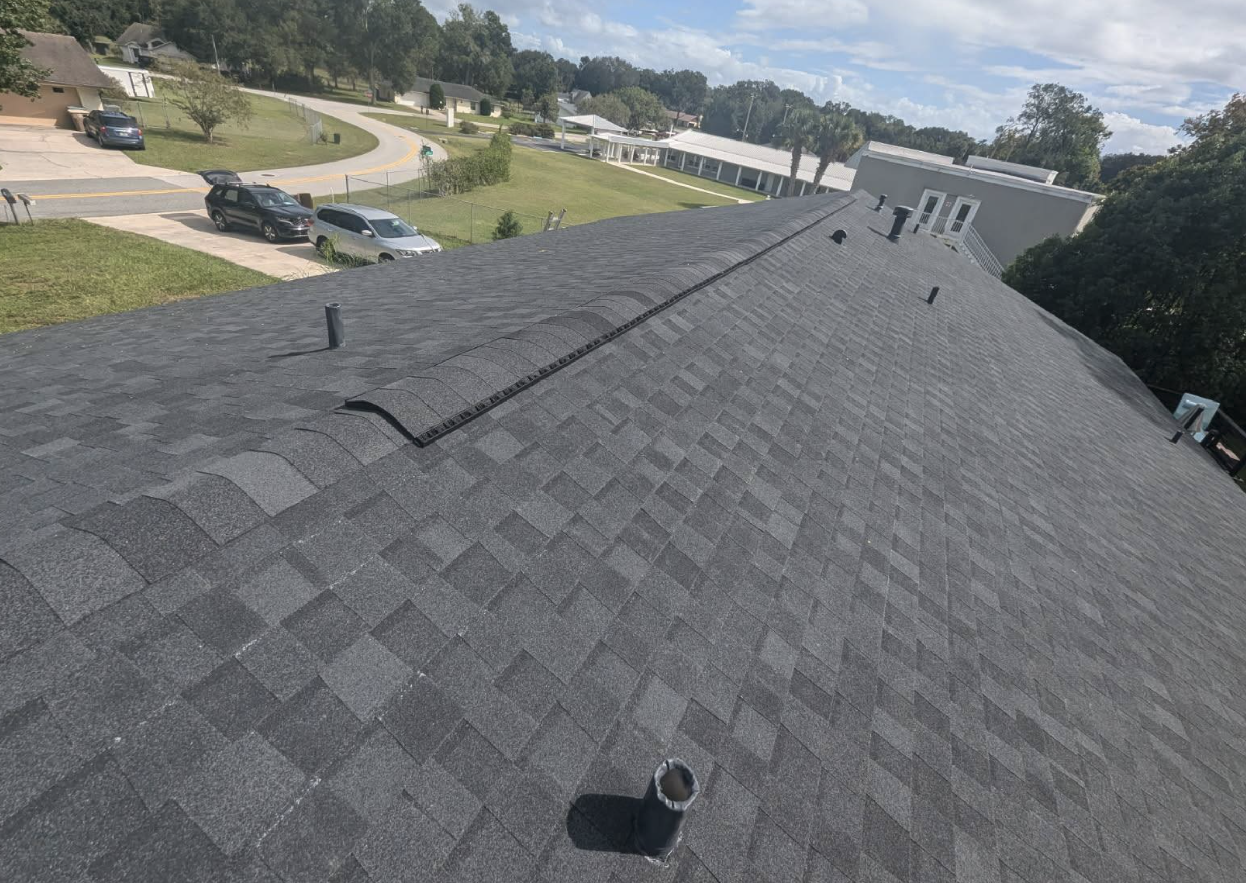 Completed residential roof replacement project at White Springs Florida featuring architectural asphalt shingles.